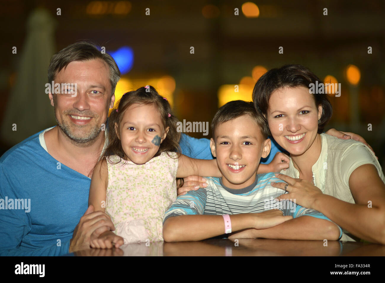Happy family  in cafe Stock Photo
