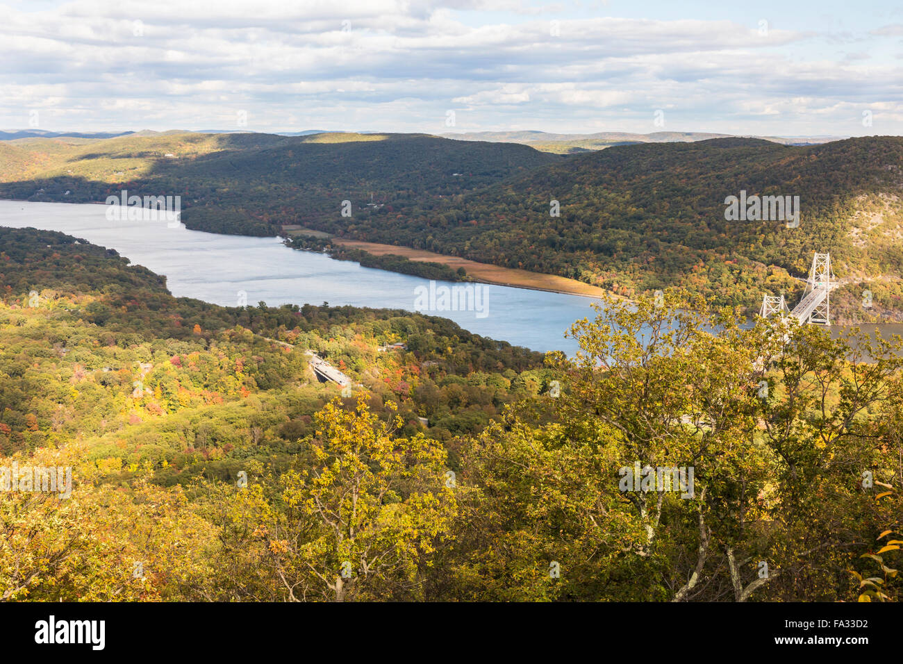 Early Autumn on the Hudson River and Bear Mountain Bridge in Bear Mountain State Park, New York. Stock Photo