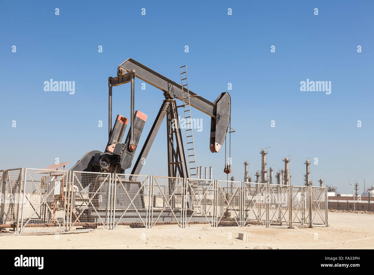 Oil pump in the desert Stock Photo Alamy