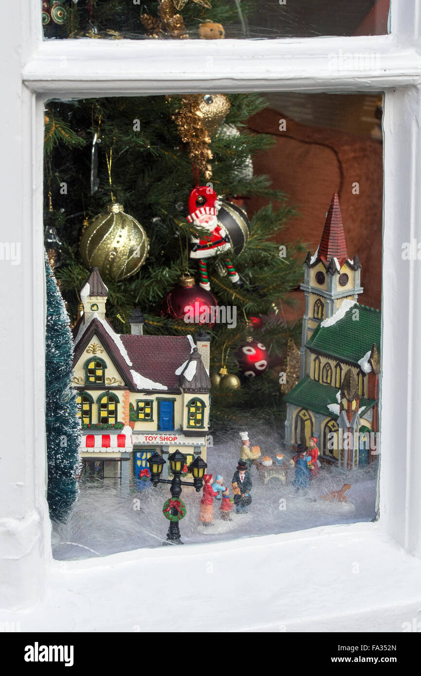 Christmas toys snow scene window display. Broadway, Cotswolds, England Stock Photo