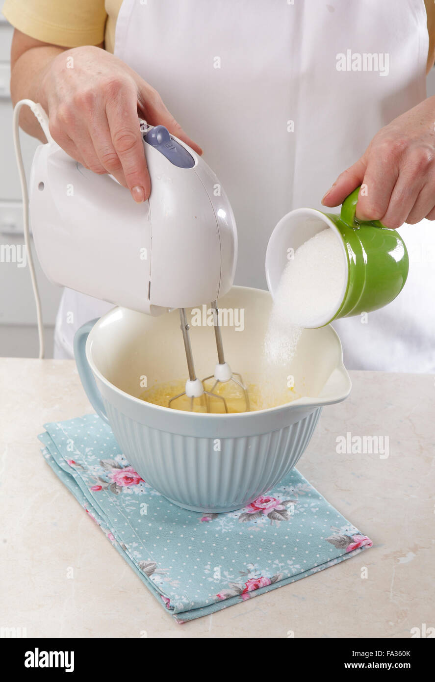 Poppy seed cake with apricots + steps Stock Photo Alamy