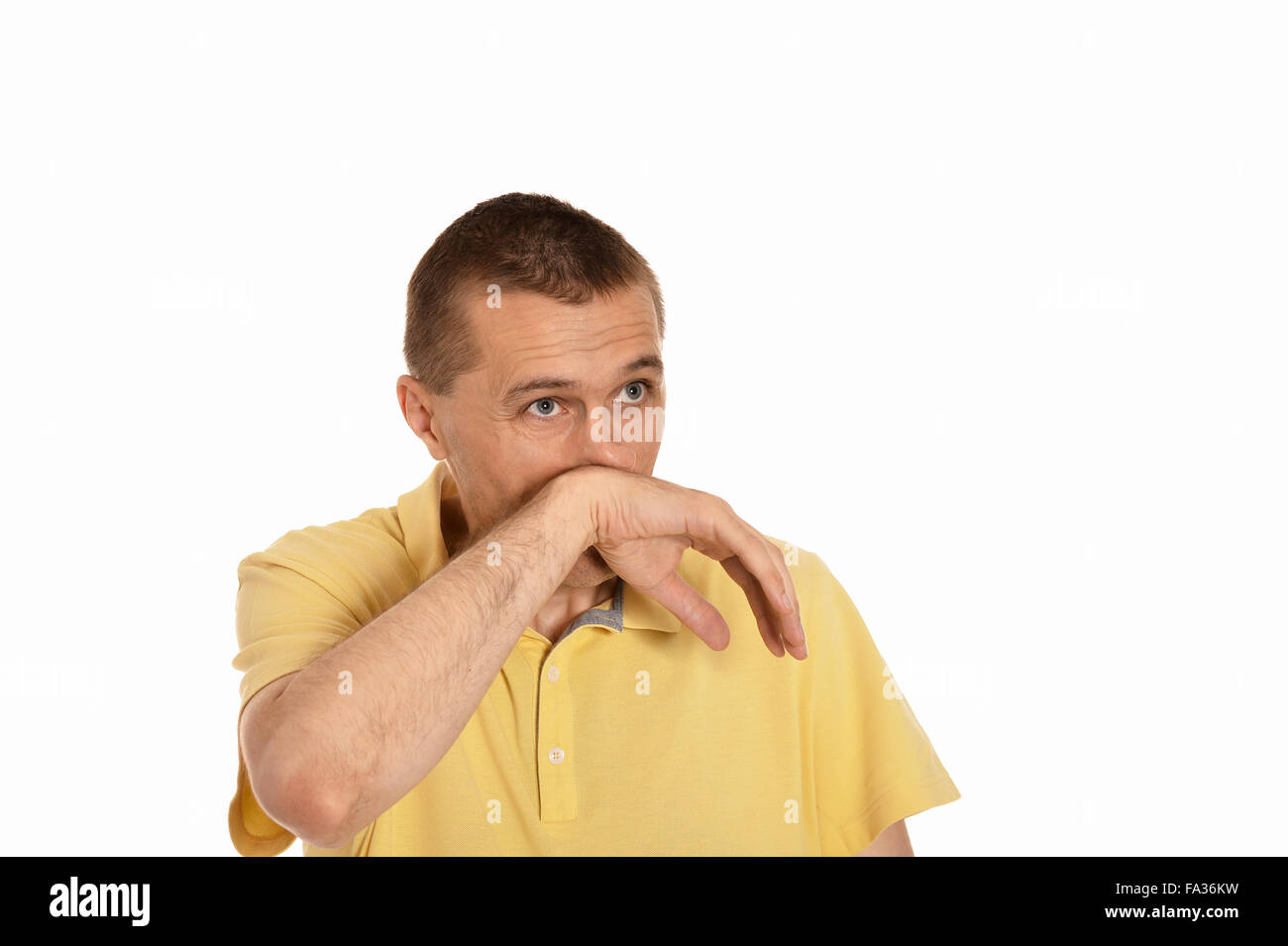 Man wiping snot by his hand Stock Photo