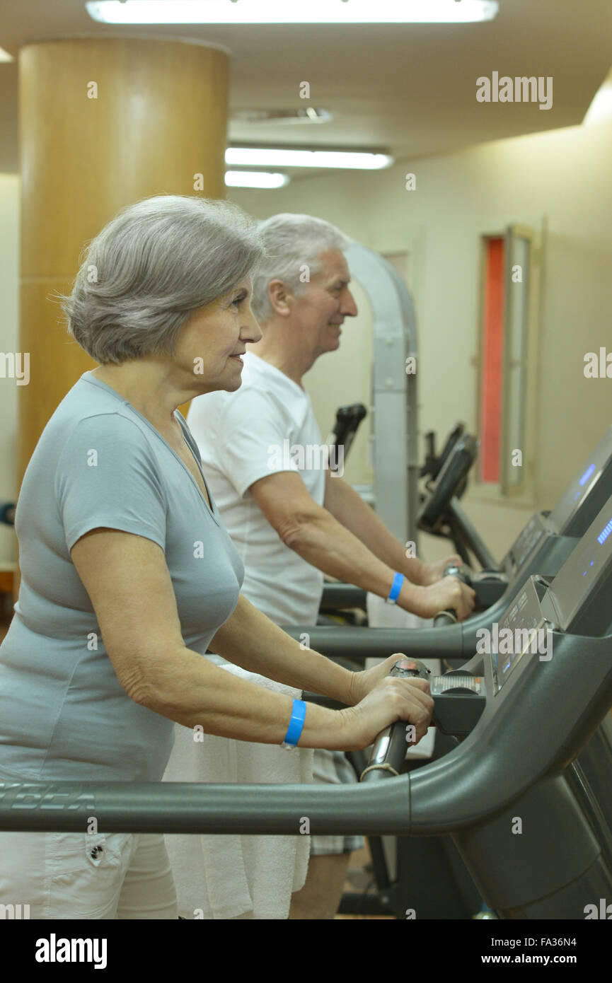Senior couple exercising in gym Stock Photo - Alamy