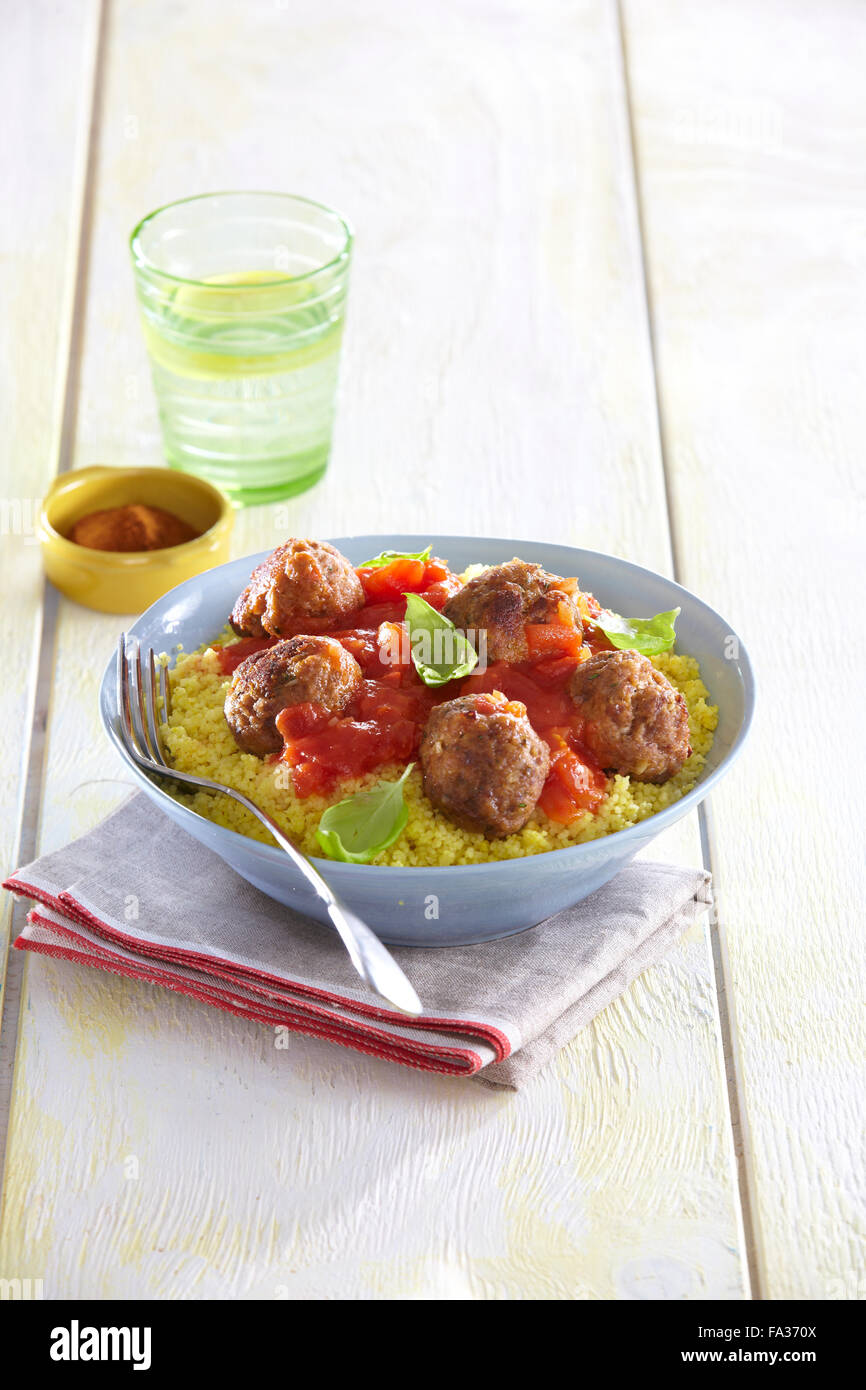 Spicy meat balls with couscous Stock Photo Alamy