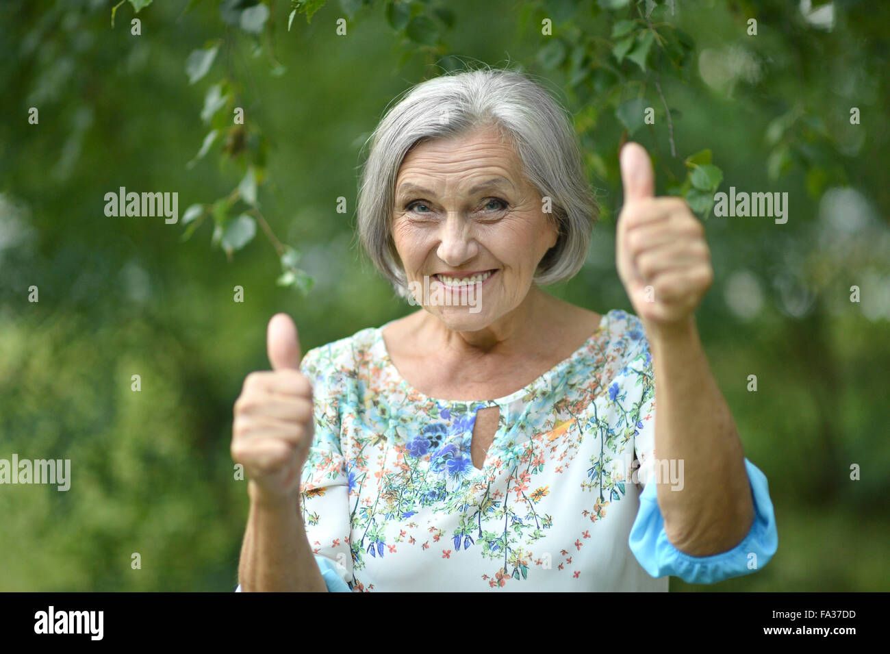 Lovely woman thumbs up hi-res stock photography and images - Alamy