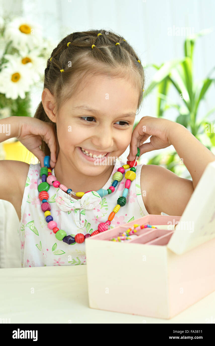 cute-little-girl-with-beads-stock-photo-alamy