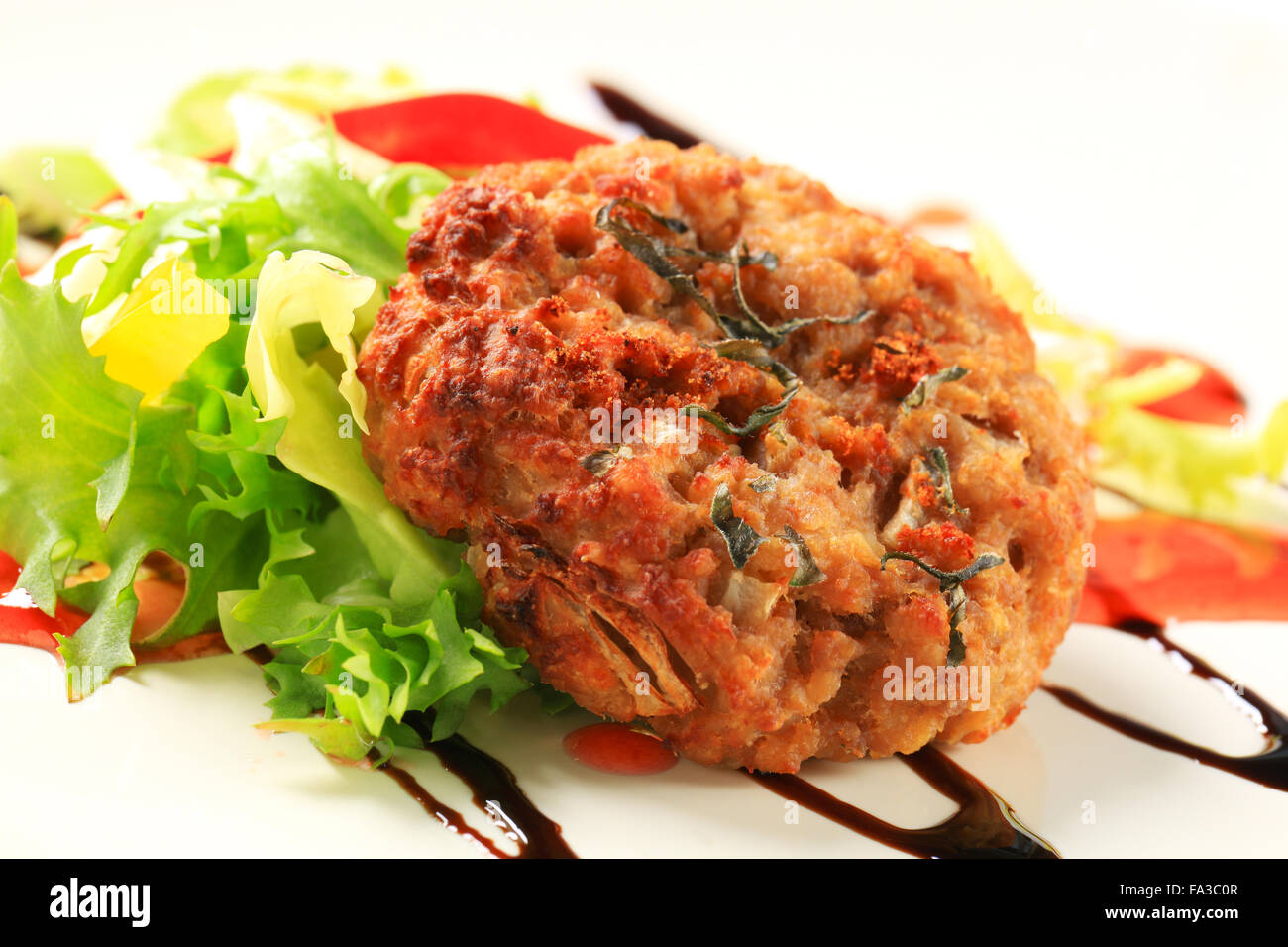 Vegetable burgers with balsamic vinegar sauce Stock Photo Alamy