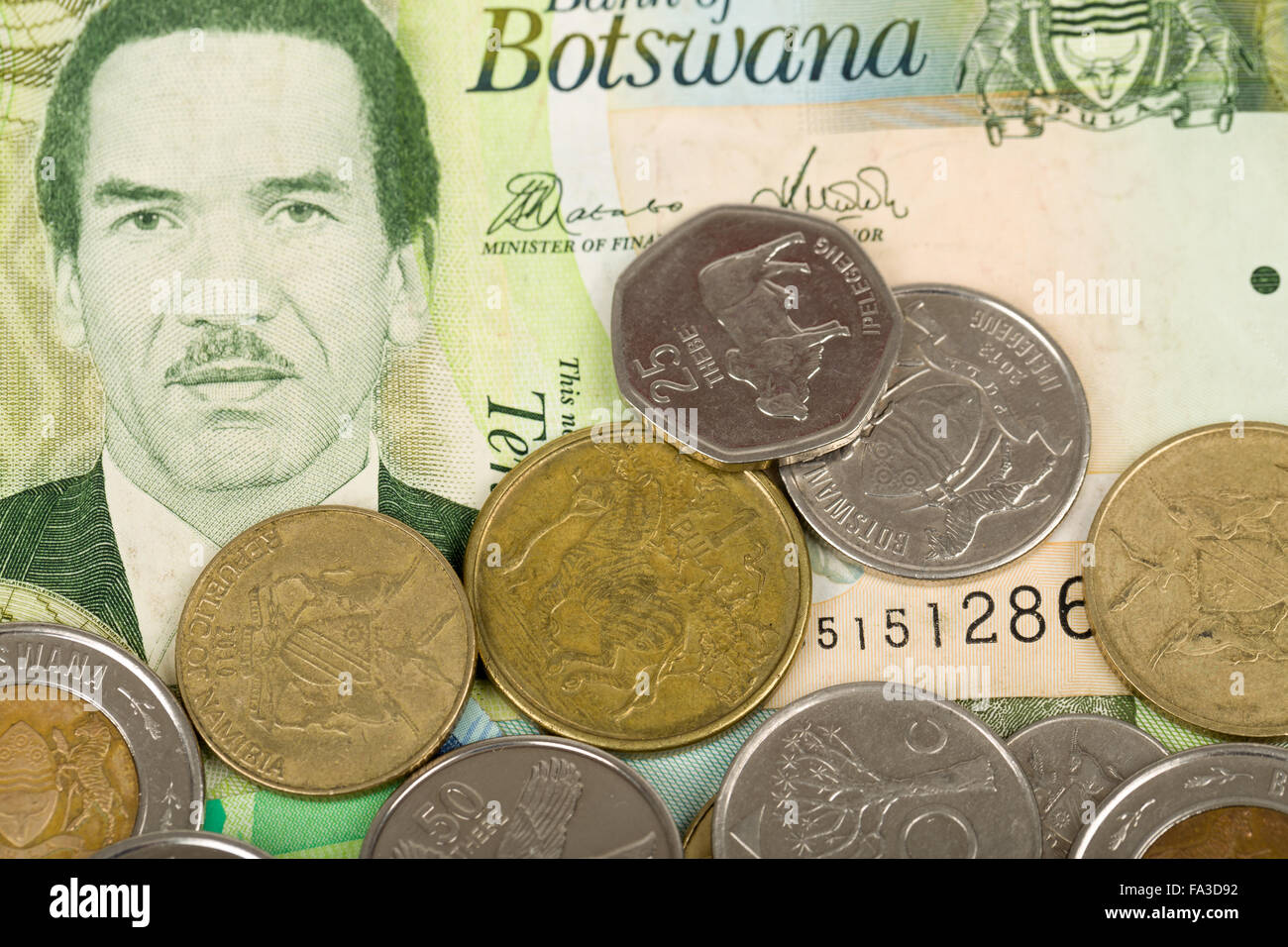 South african countries banknotes and coins for background. Botswana