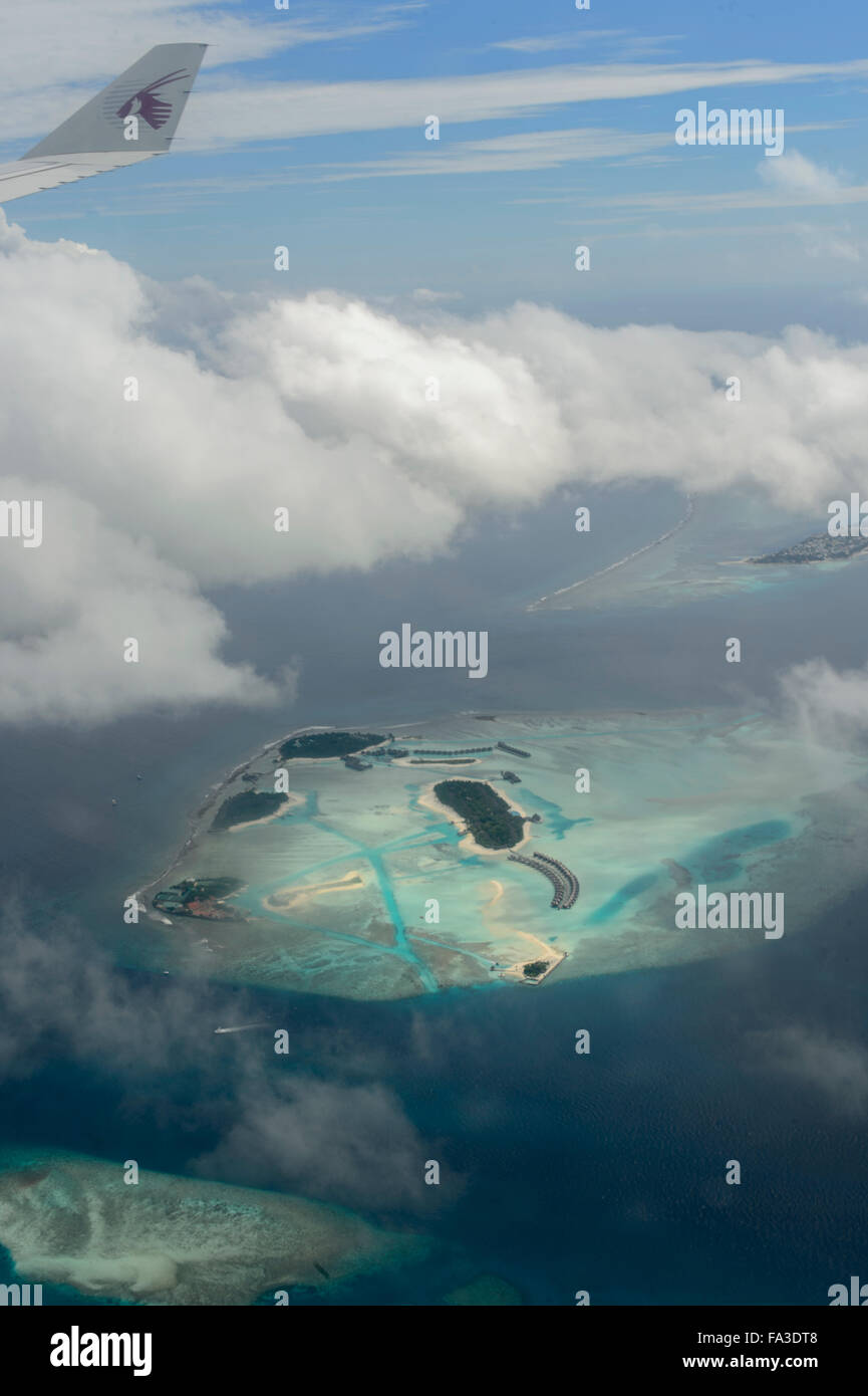 Aircraft in flight over the Maldives with Qatar Airways Stock Photo Alamy