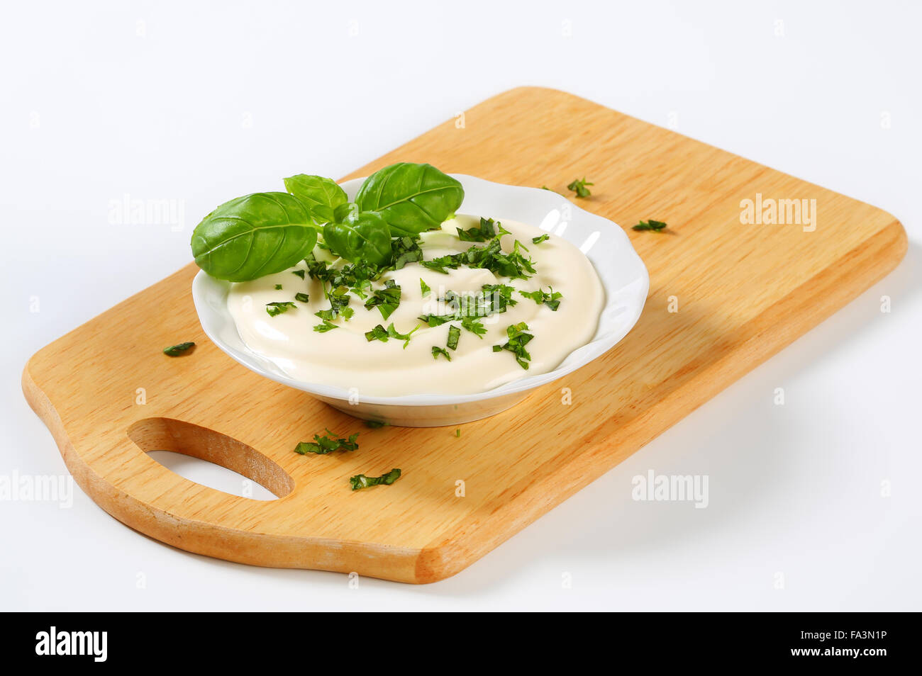 MayoSour Cream Dressing with chopped parsley Stock Photo Alamy