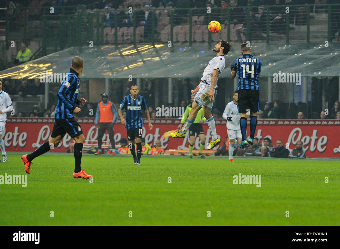Milan, Italy. Decembe 20th, 2015. Stefan Radu of SS Lazio and Martín Montoya of FC Inter in action during the Italian Serie A League soccer match between Inter Milan and SS Lazio at San Siro Stadium in Milan, Italy. Credit:  Gaetano Piazzolla/Alamy Live News Stock Photo