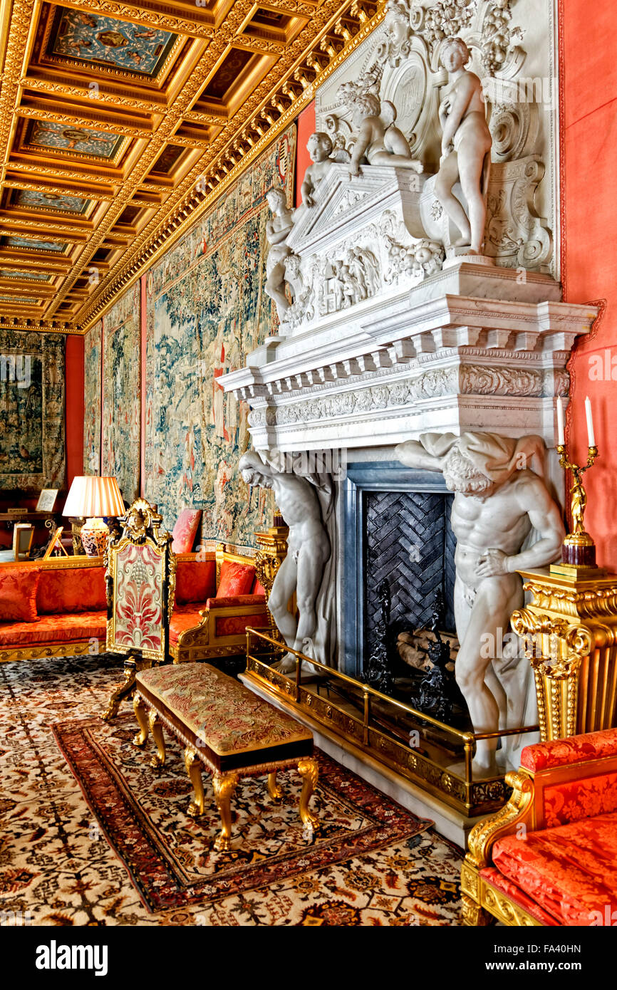 The huge Carrara marble fireplace in the Saloon at Longleat House, Wiltshire, United Kingdom. Stock Photo
