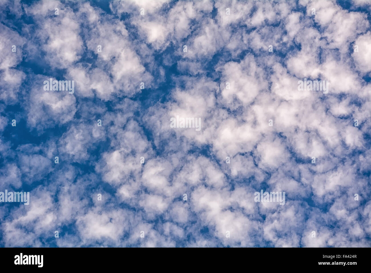 blue sky background with tiny clouds Stock Photo - Alamy