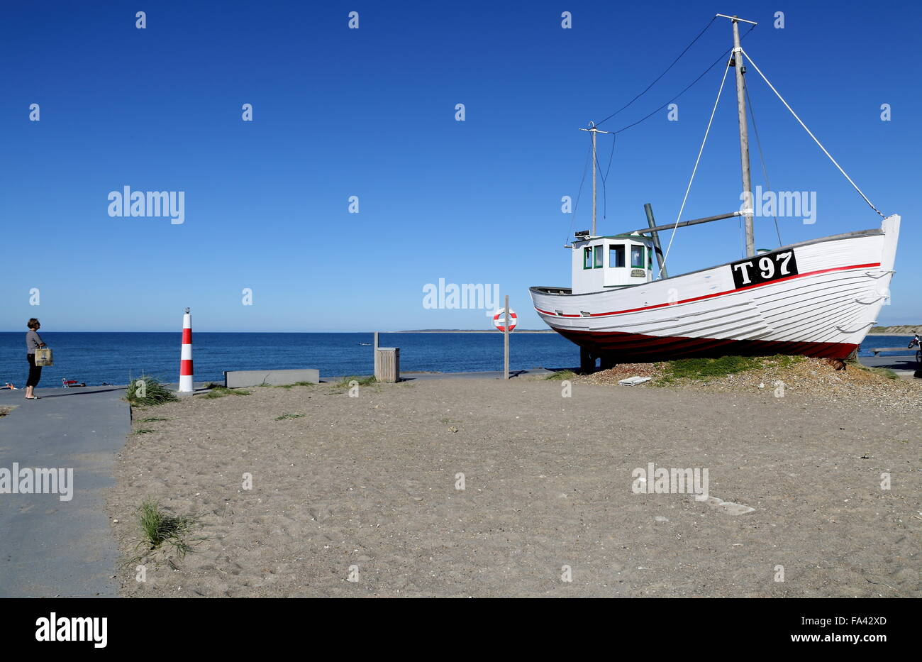 Fishing vessel on the beach after fishing Stock Photo