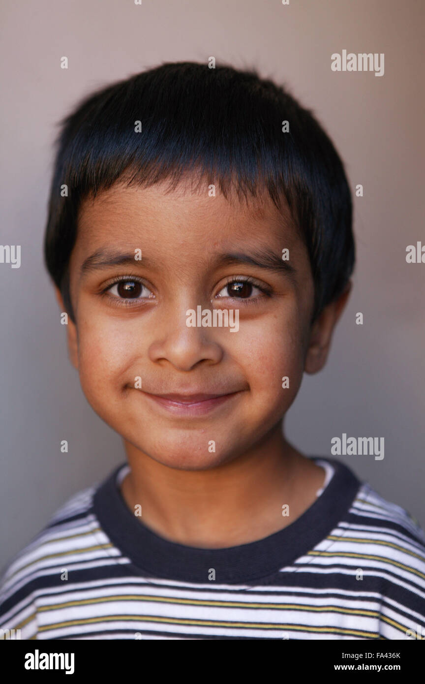 Portrait of a young boy smiling Stock Photo - Alamy