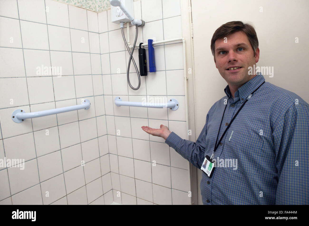 Occupational therapist with grab rail in a shower Stock Photo Alamy