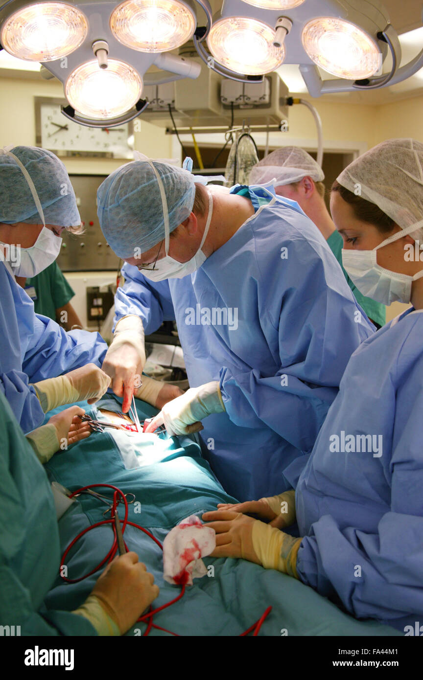 Surgeon performing Hernia Operation and teaching student Doctor in the
