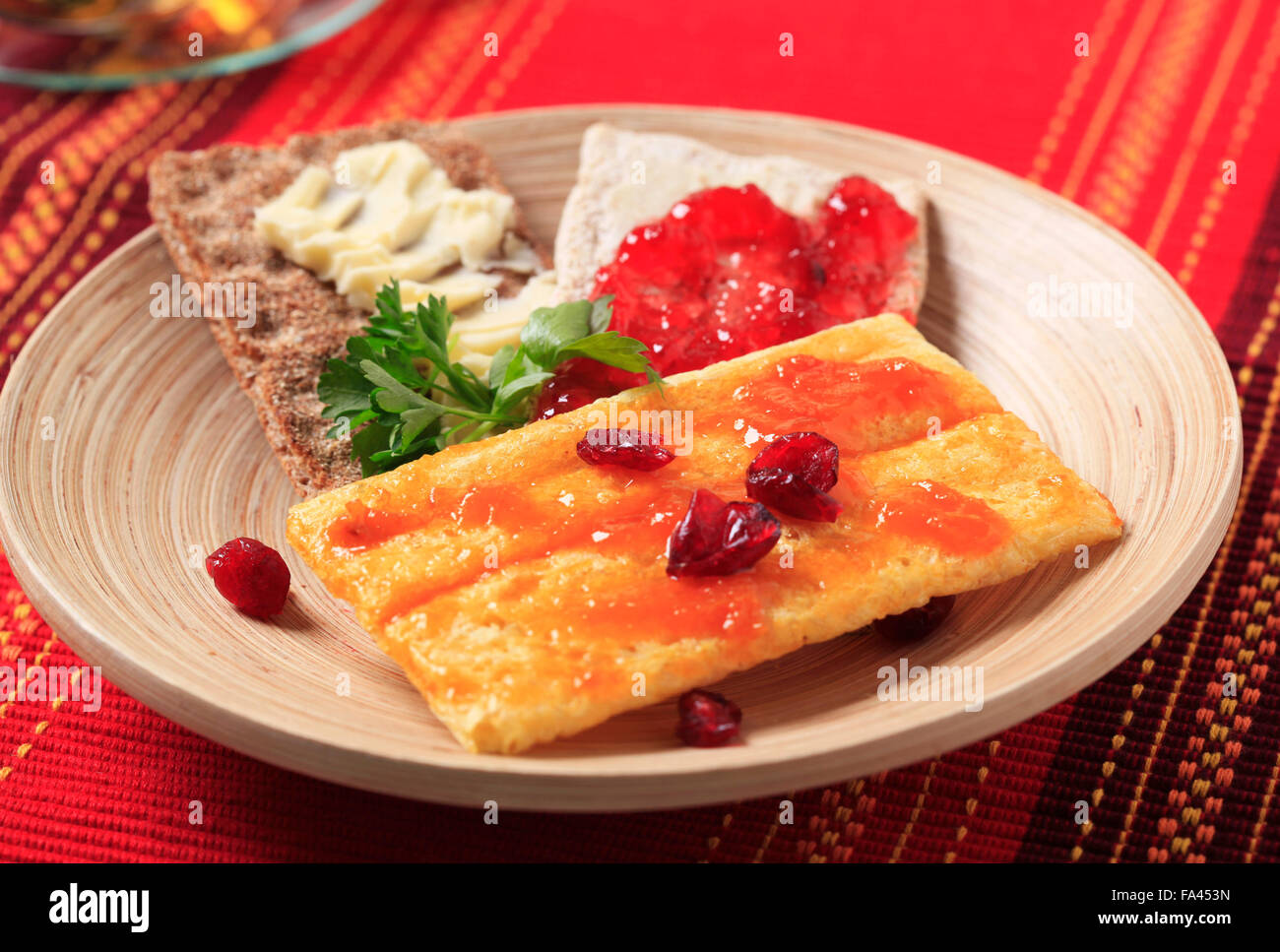 Crispbread with butter and jam Stock Photo Alamy