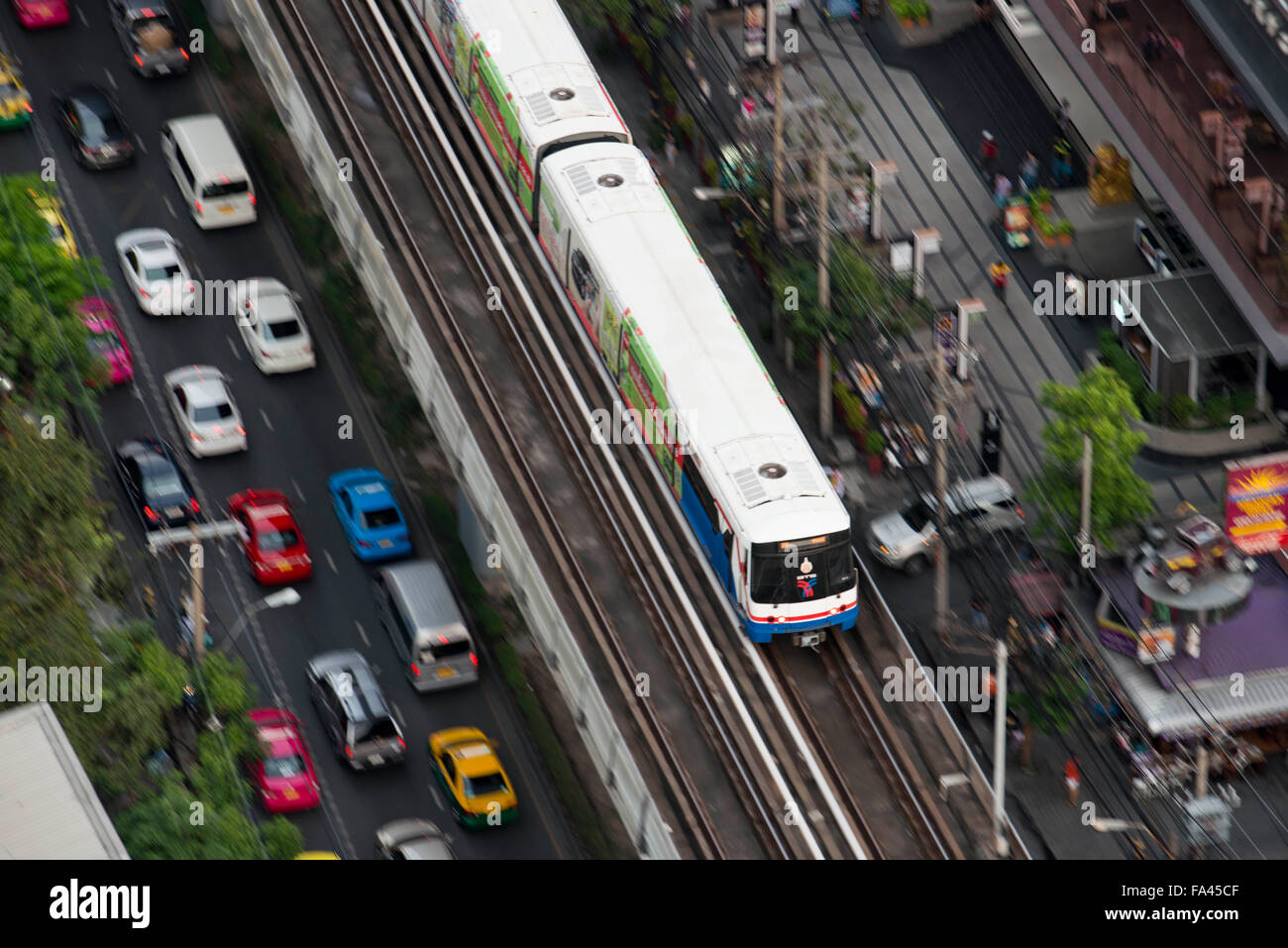 Aerial view of the sky train BTS in Sukhumvit. Skytrain BTS train en route over Sukhumvit in Bangkok city centre Thailand Stock Photo