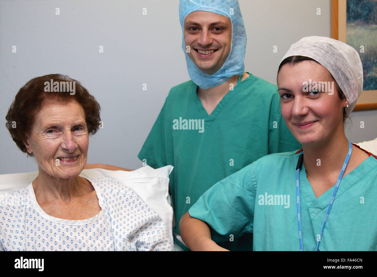 Patient before operation with Department Practitioner and student ODP, Stock Photo