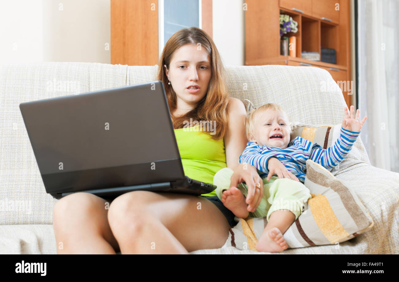 Baby With Laptop Crying High Resolution Stock Photography and Images ...