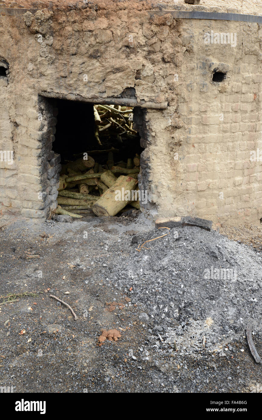 Traditional charcoal making kilns in Kenya at Soysambu conservancy near