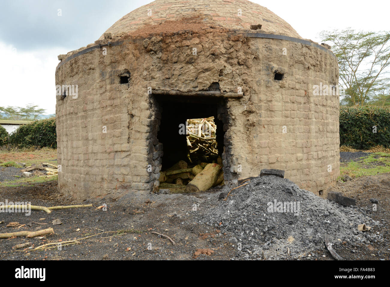 Traditional charcoal making kilns in Kenya at Soysambu conservancy near