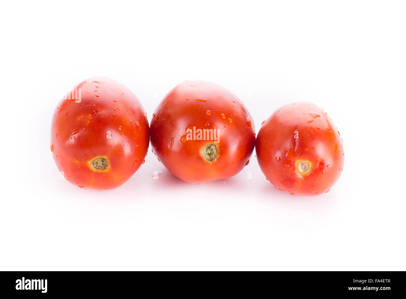 Red tomatoes isolated on white background Stock Photo - Alamy