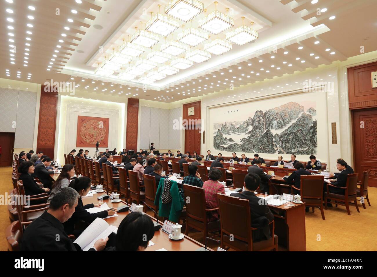 Beijing, China. 21st Dec, 2015. Zhang Dejiang, chairman of the Standing Committee of China's National People's Congress (NPC), attend a group meeting reviewing the draft law of counterterrorism and the draft law against demestic violence, during the 18th session of the 12th NPC Standing Committee, in Beijing, capital of China, Dec. 21, 2015. Credit:  Ding Lin/Xinhua/Alamy Live News Stock Photo