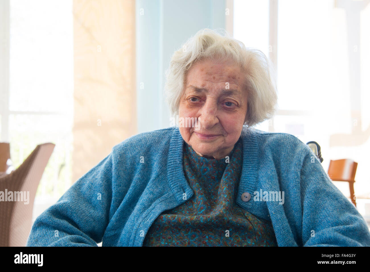 Portrait of old woman in a nursing home. Stock Photo
