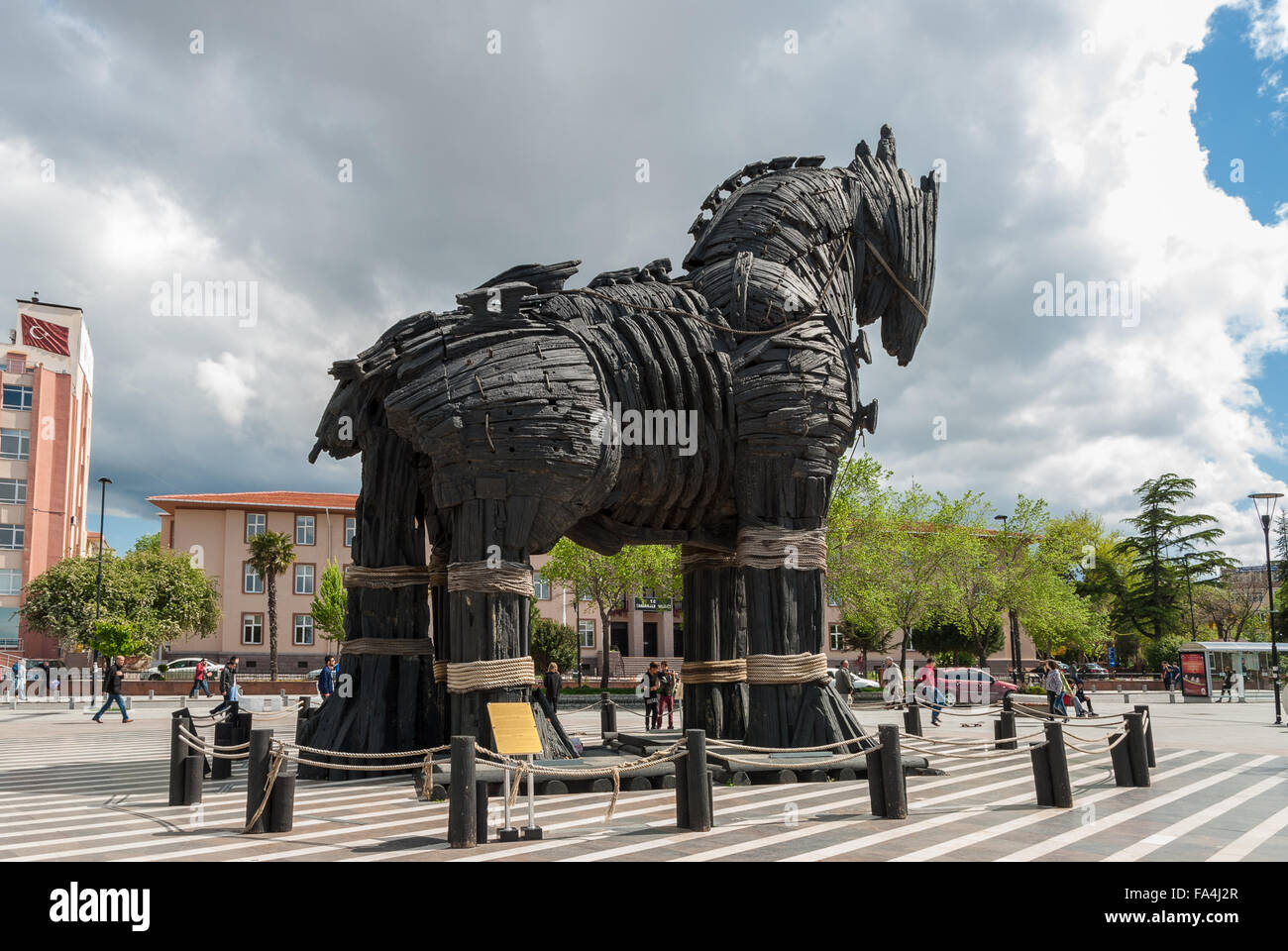 Local people and tourists walk near the Movie-famous Trojan Horse on April 19, 2014 in Canakkale, Turkey. Stock Photo