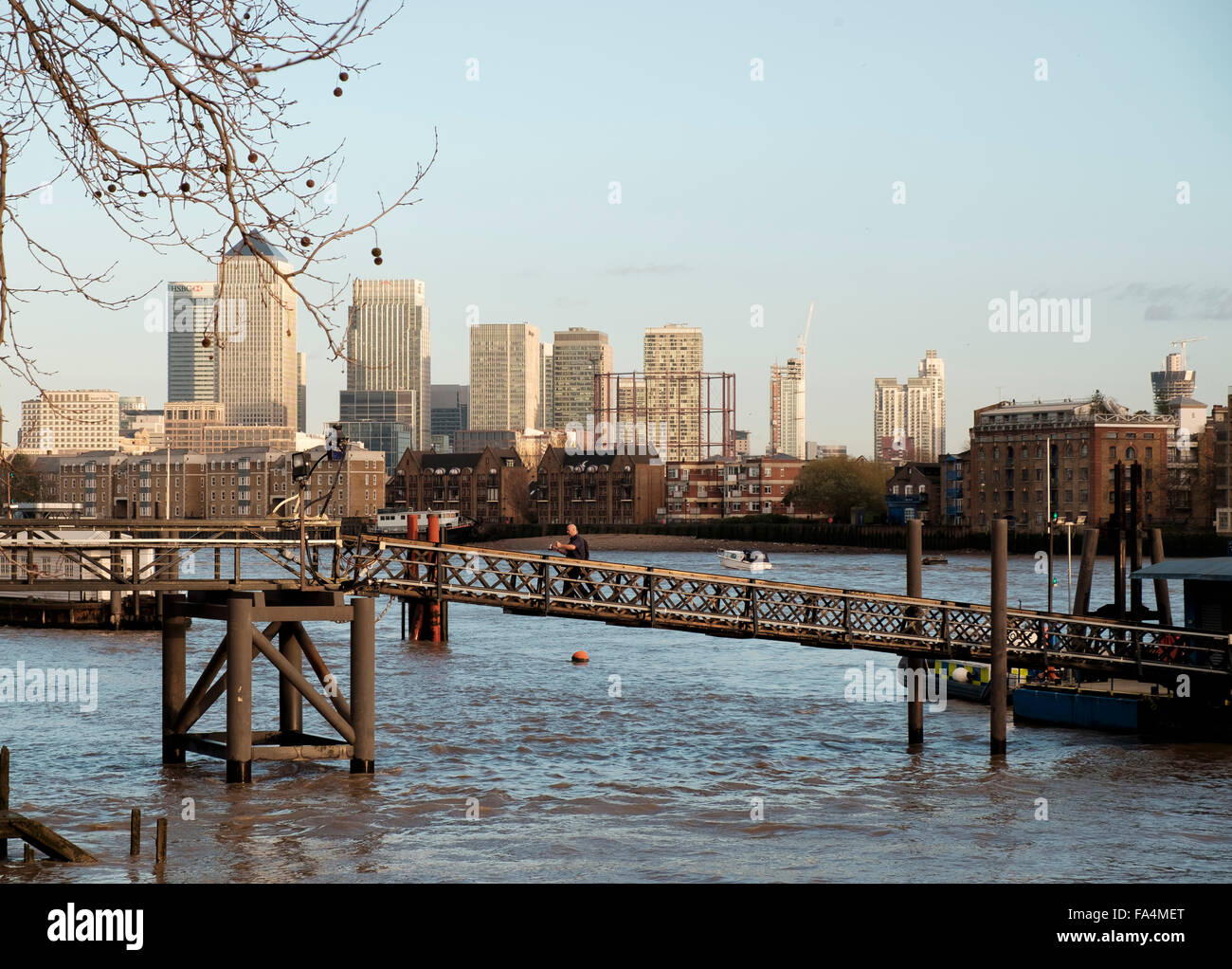 London, 25 November 2015: Canary Wharf viewed through the jetty of the Metropolitan Police Marine Policing Unit Wapping Stock Photo