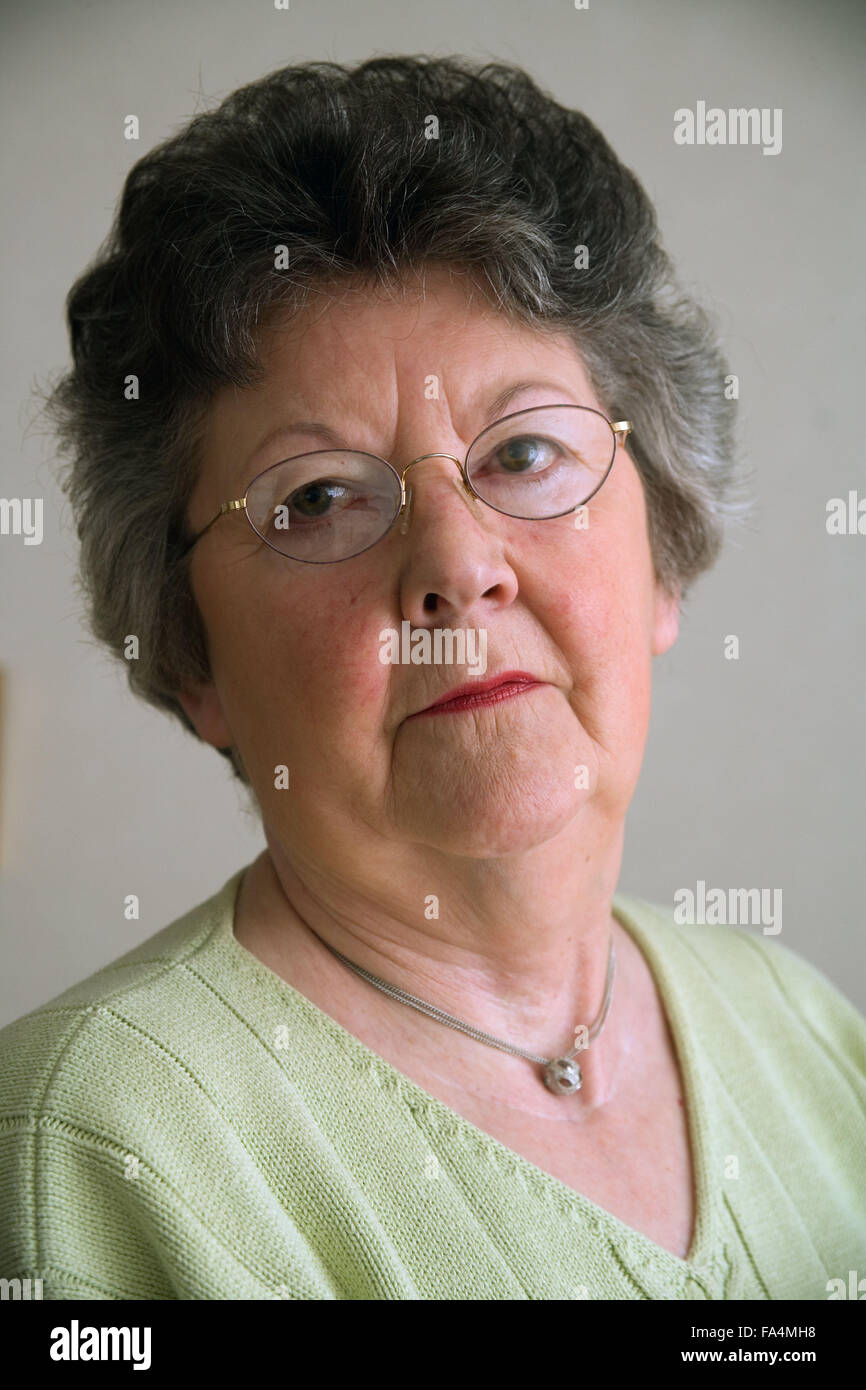 Woman; looking serious, Stock Photo