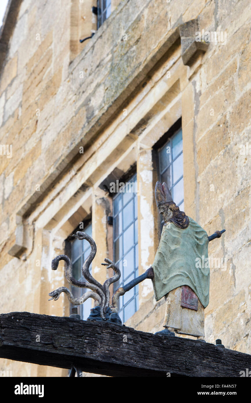 St. Patrick banishing the snakes from Ireland sign in Broadway, Cotswolds. England Stock Photo