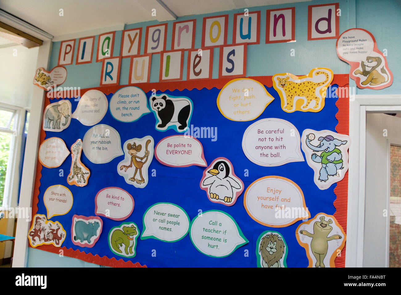 Playground rules' display on wall in school classroom, Stock Photo