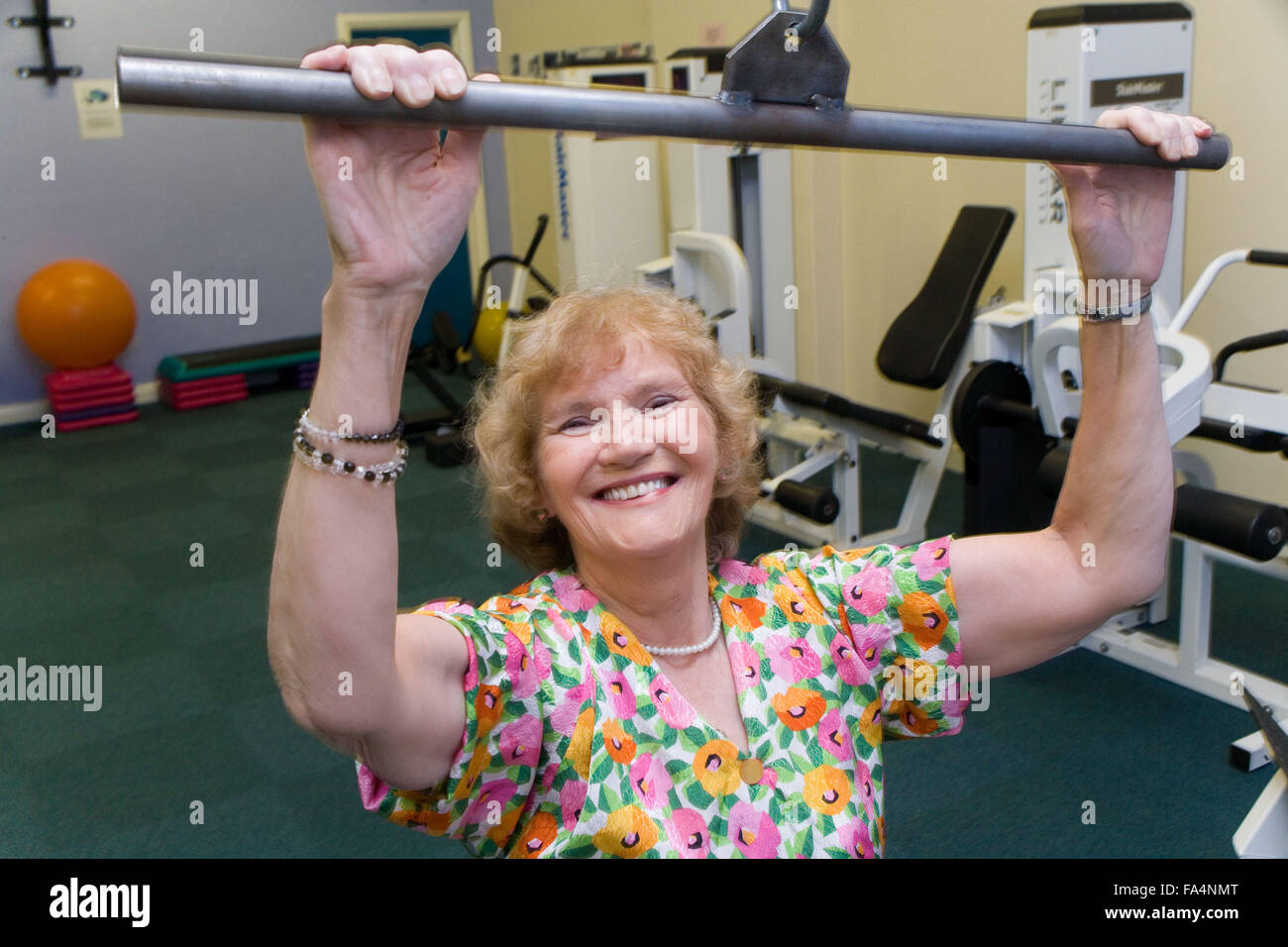 Women using lat pull down equipment in a YMCA gym Stock Photo Alamy