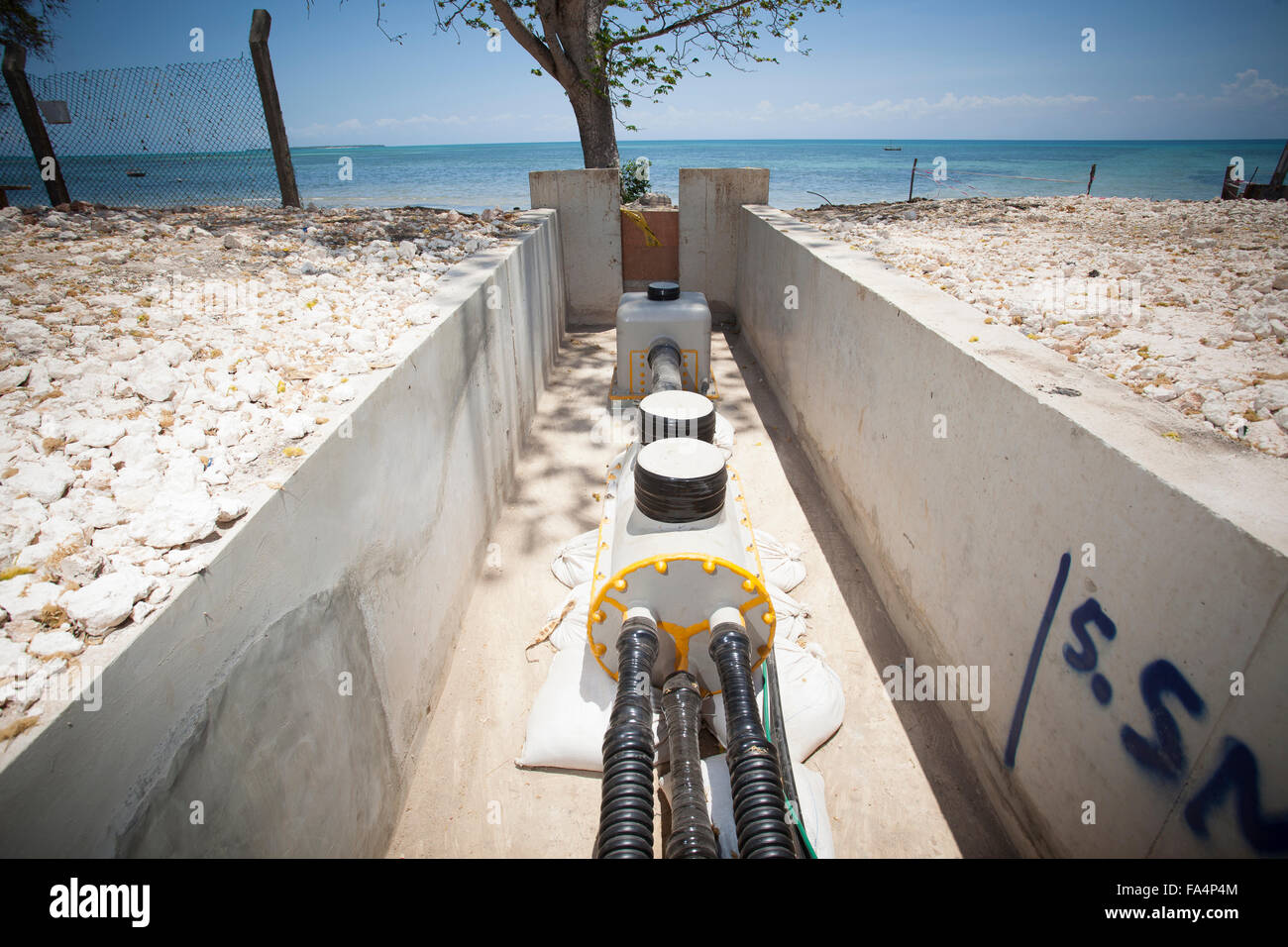 Undersea power cable emerging on shores of Zanzibar from mainland