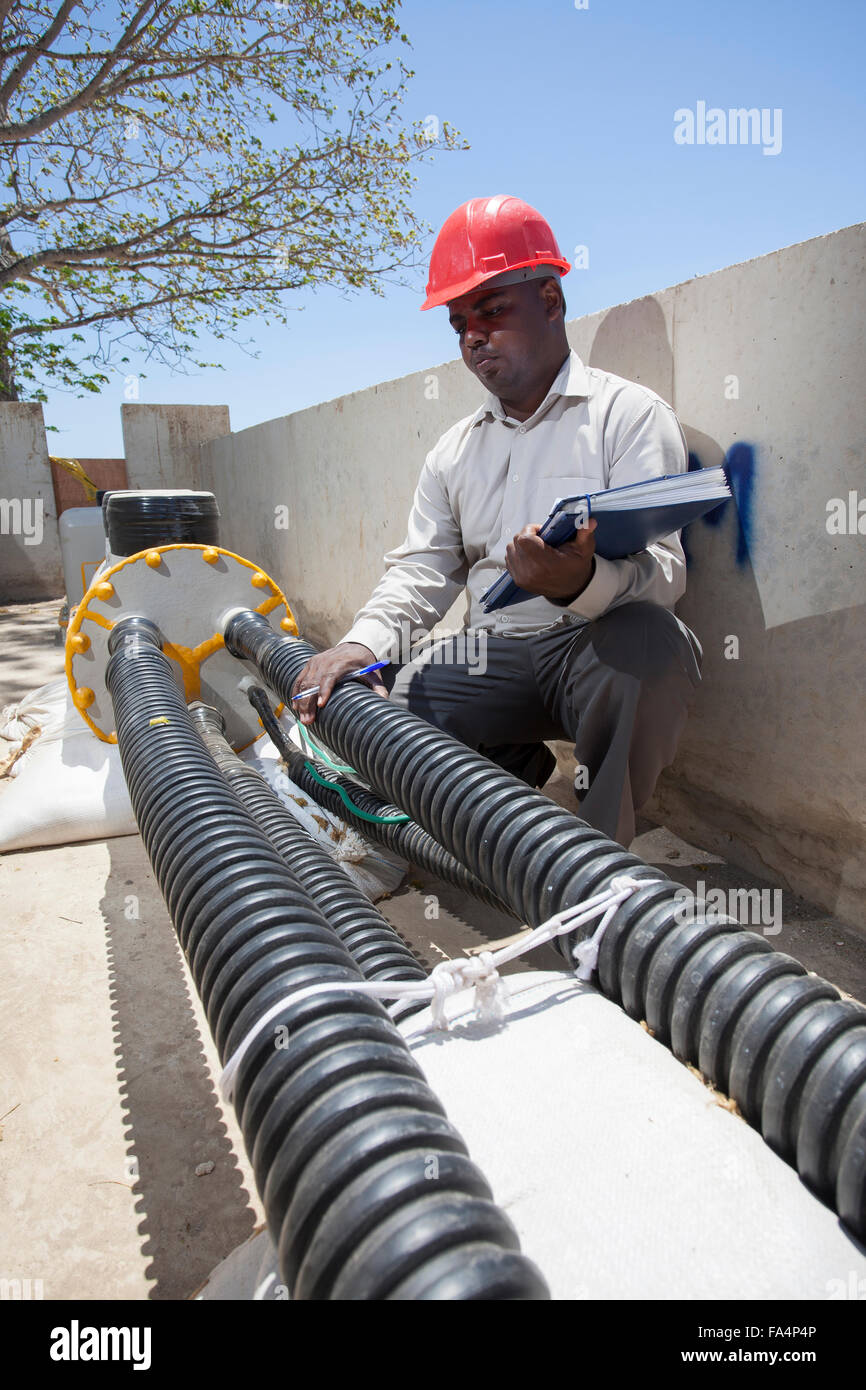Undersea power cable emerging on shores of Zanzibar from mainland