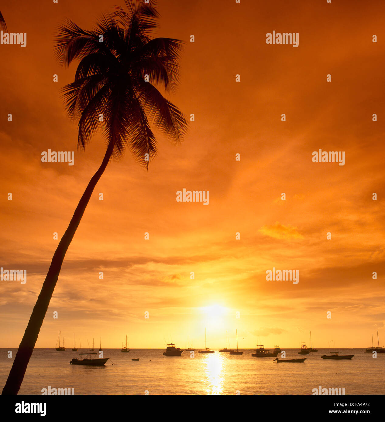 TRINTOB Sunset at Pigeon Point, Tobago, Trinidad and Tobago, Caribbean - taken in 1998, before the beach was spoiled by overdevelopment Stock Photo