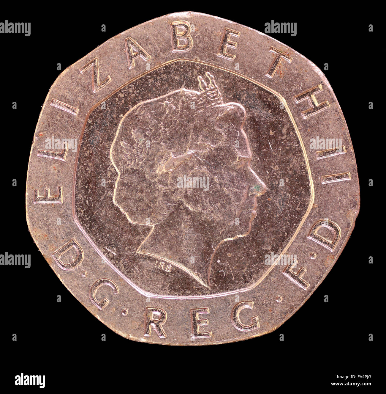 The head face of twenty pence coin, issued by United Kingdom in 2006, depicting the portrait of Queen Elizabeth. Image isolated Stock Photo