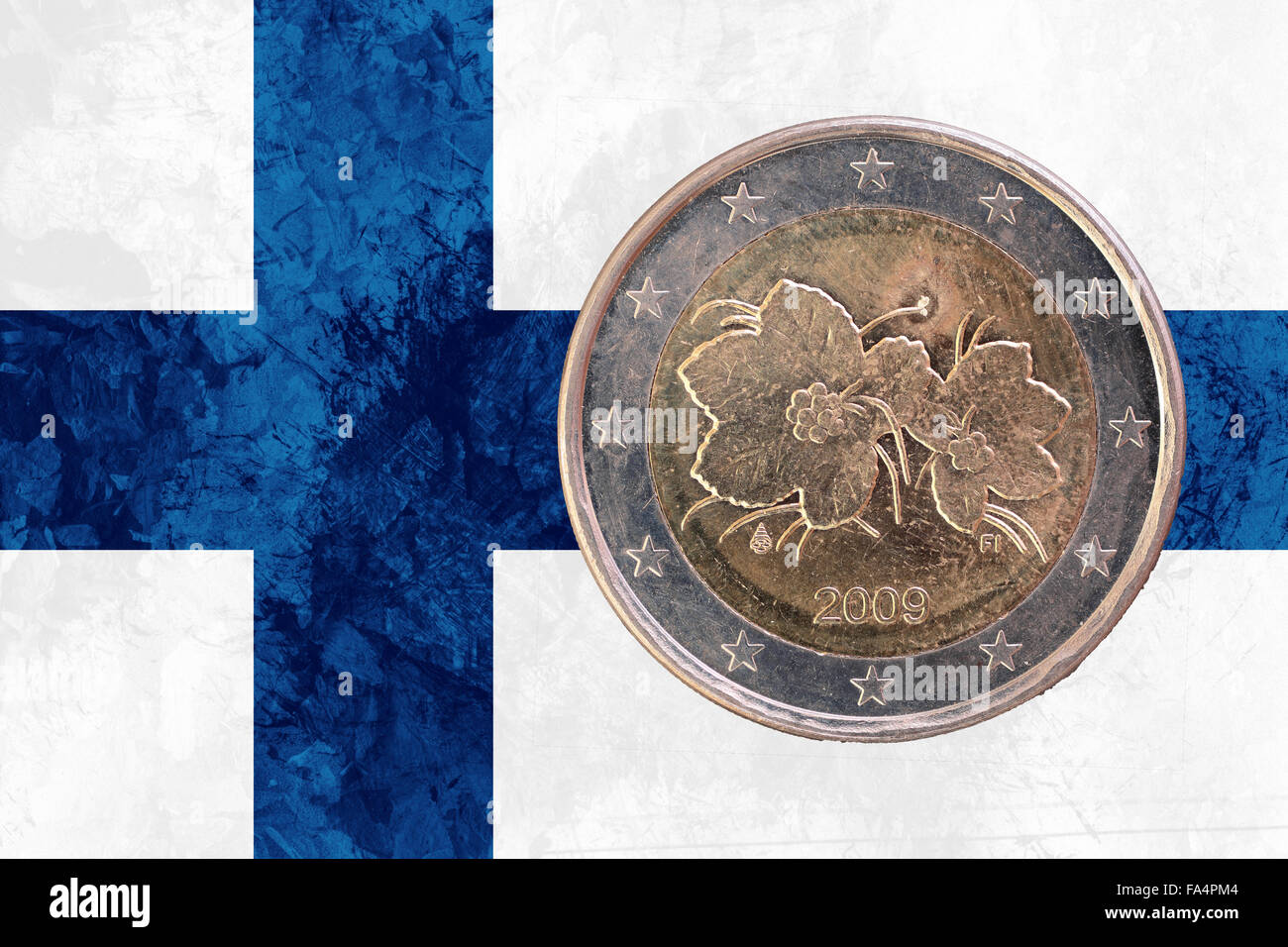 Two euros coin from Finland isolated on the national finnish flag as background Stock Photo