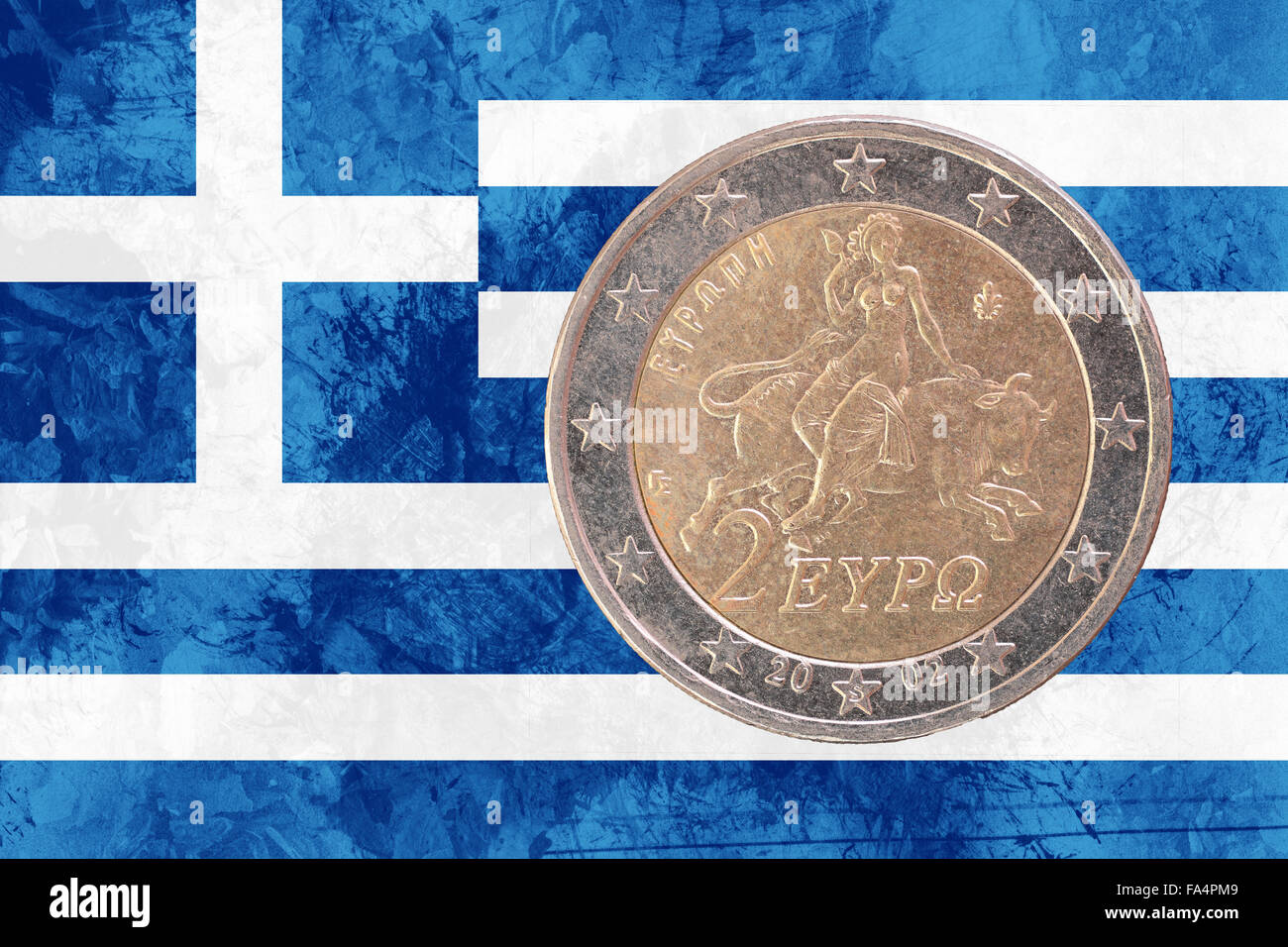 Two euros coin from Greece isolated on the national greek flag as background Stock Photo