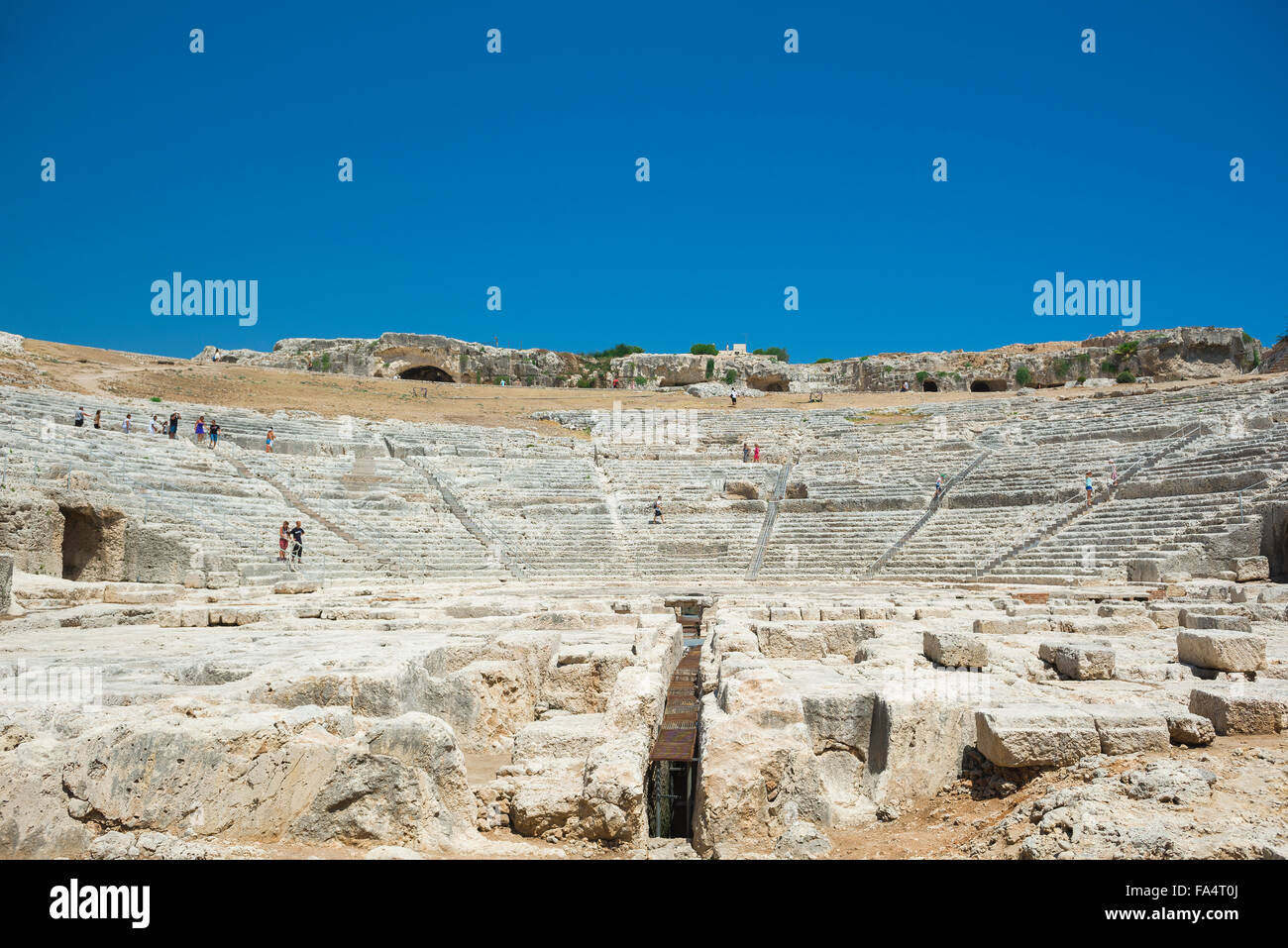 Greek theatre Syracuse Sicily, view of the auditorium (cavea) of the ancient Greek theater in the Archaeological Park (Parco Archeologico) Sicily. Stock Photo