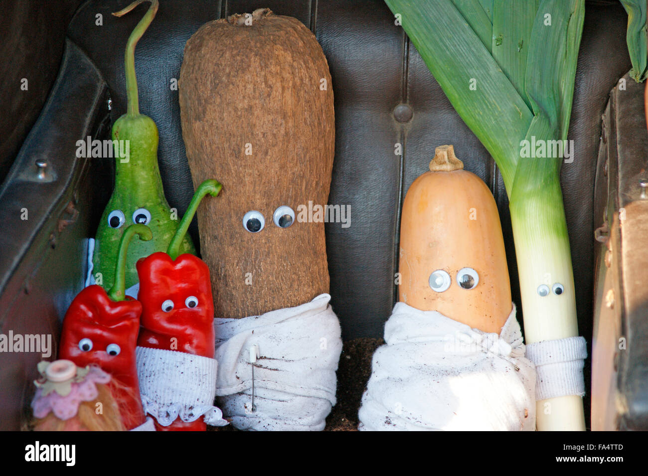 Vegetable babies in a pram Stock Photo