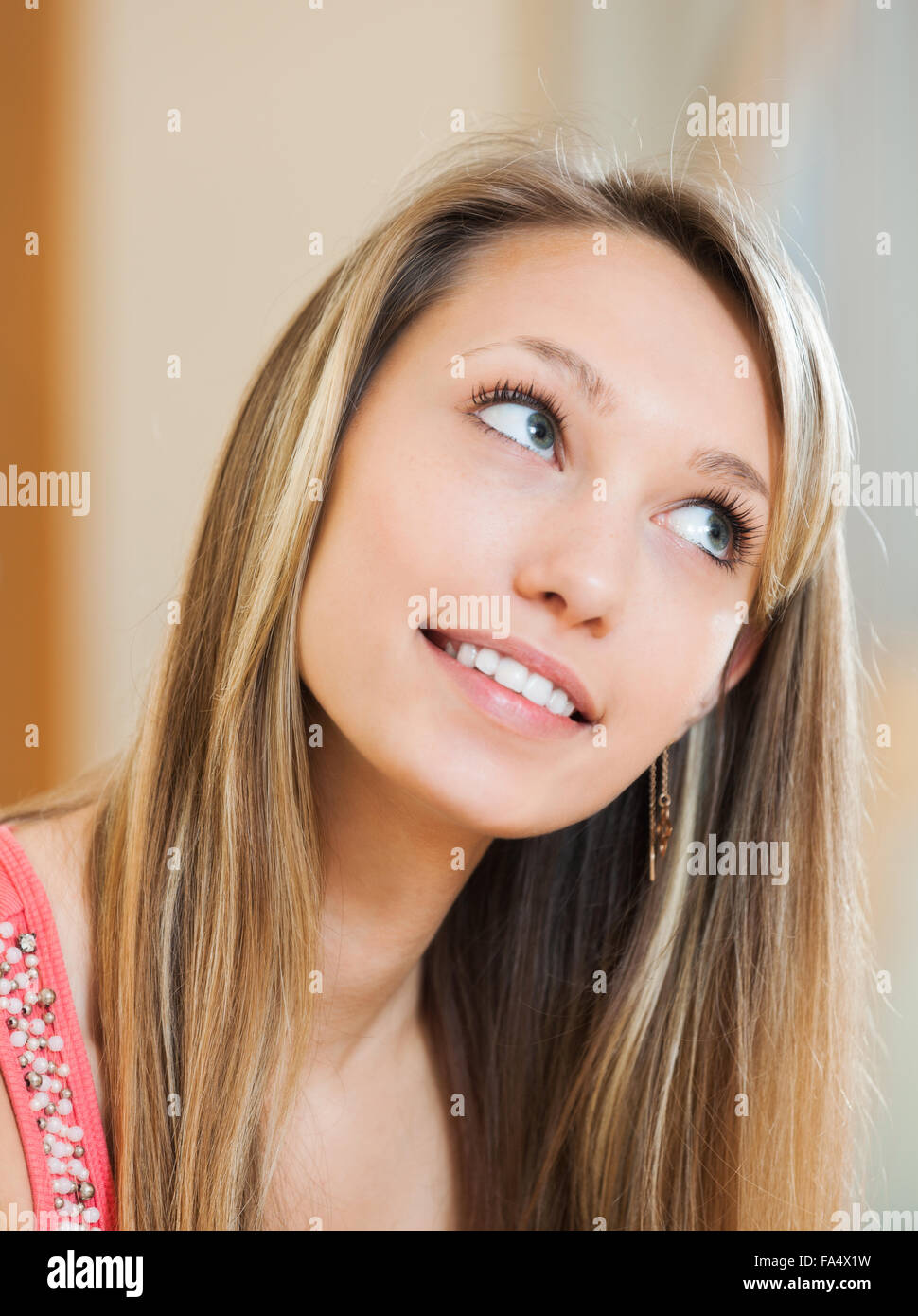 Happy student girl with flowing hair and wide smile Stock Photo - Alamy