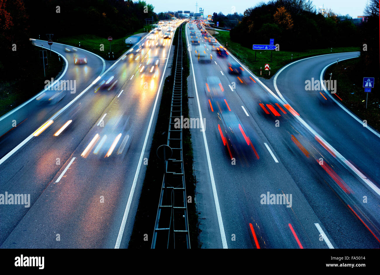 cars on highway Autobahn in Germany in high speed at night Stock Photo