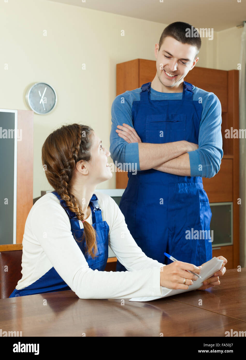 happy teamwork of workers looking financial documents Stock Photo