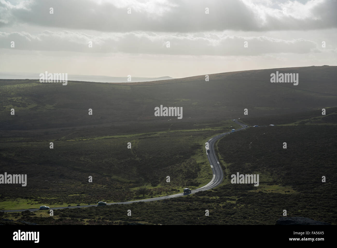 A road across dartmoor with traffic on Stock Photo Alamy
