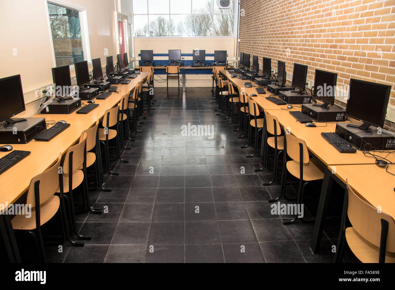empty computer classroom at highschool in holland Stock Photo