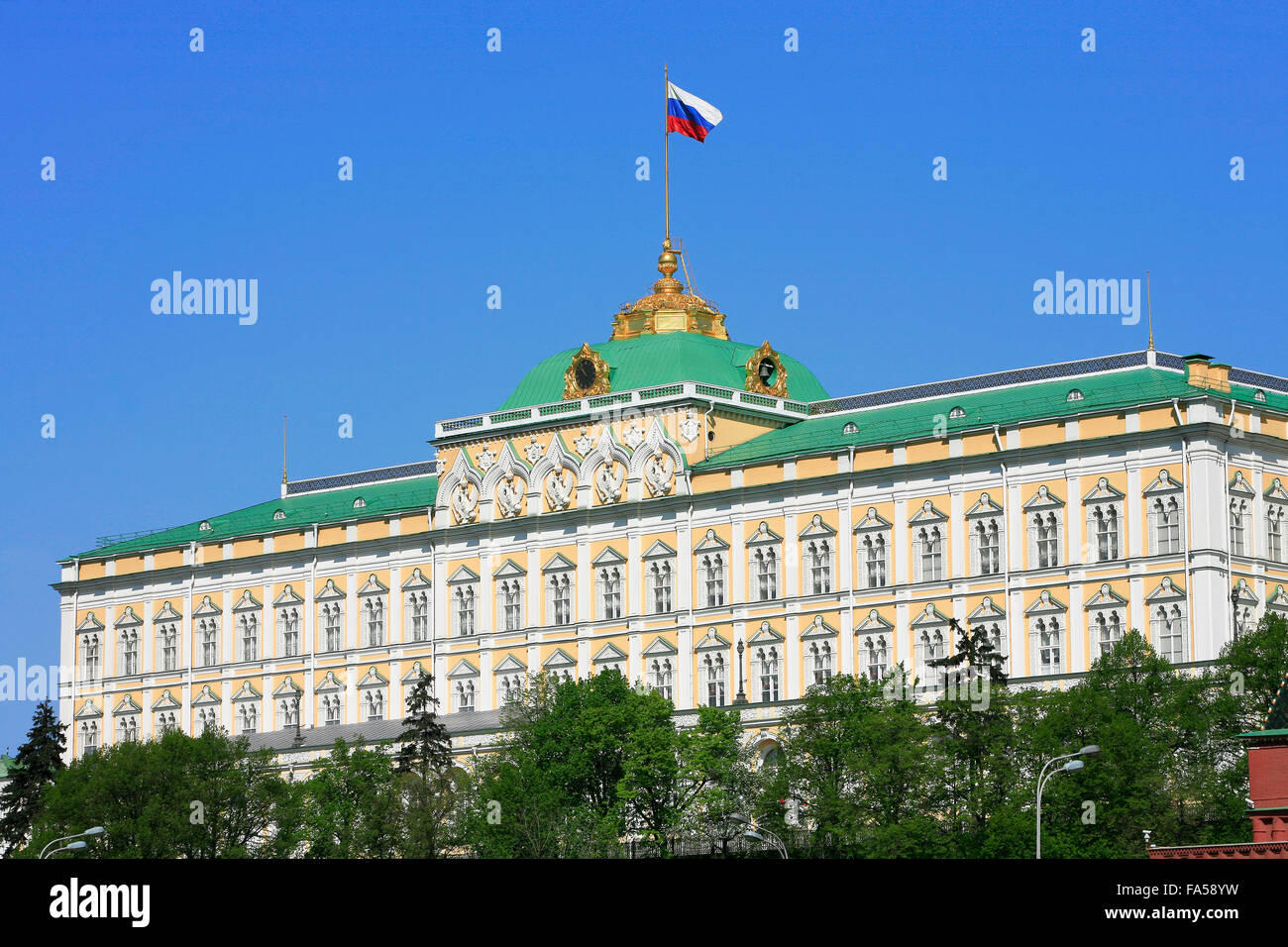The Russian flag flying over the Grand Kremlin Palace in Moscow, Russia Stock Photo